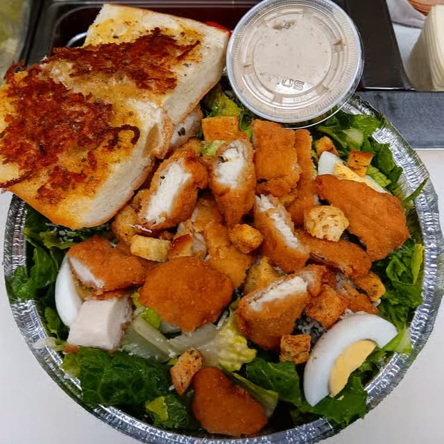 Caesar & Tenders Salad.